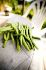 Green beans on tabl — Stock Photo
