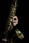 Mãos a tocar saxofone — Fotografia de Stock