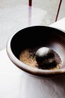 Mustard seeds with mortar and pestle — Stock Photo