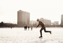 Man skating on ice rink — Stock Photo