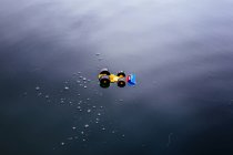 Toy car on water surface — Stock Photo