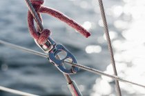 Rope and carabiner on boat — Stock Photo
