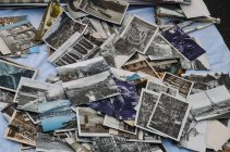 Old photographs on table — Stock Photo