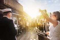 Mother and son raising toast at graduation party — Stock Photo