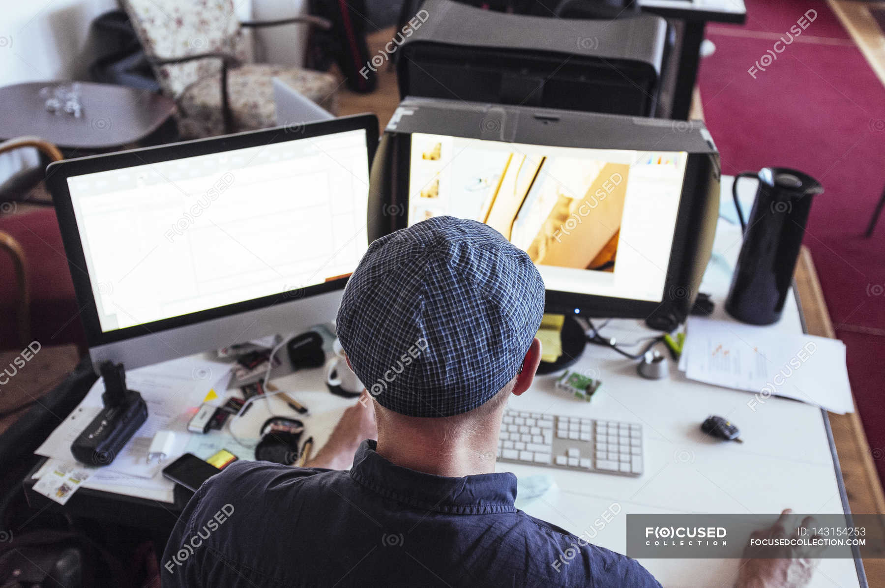 Man using computer — one person, office - Stock Photo | #143154253