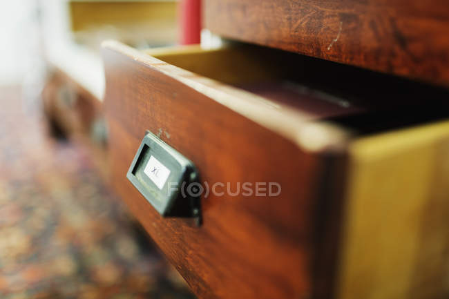 Open drawer in clothing store — Stock Photo