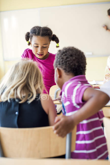 Children studying in classroom — Stock Photo