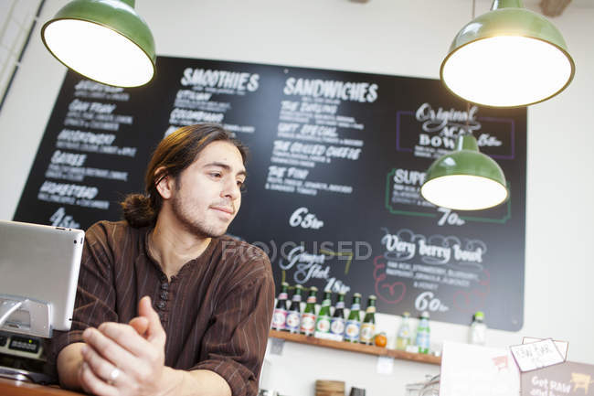 Male owner looking away — Stock Photo