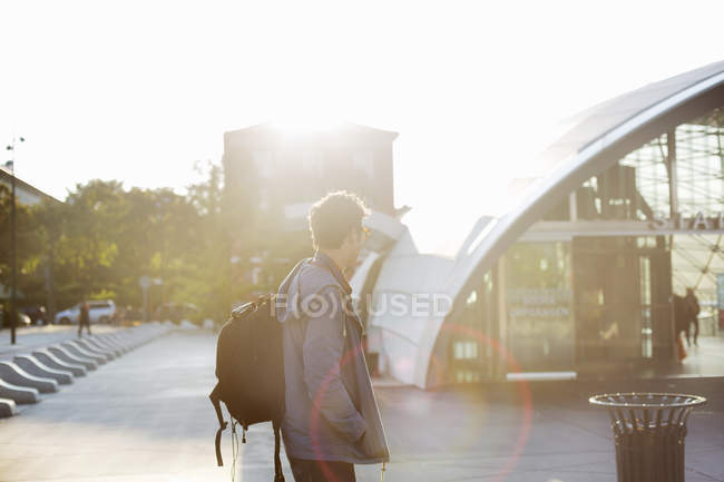 Side view of man with backpack — Stock Photo