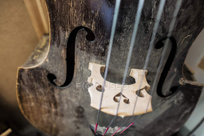 Vintage guitar in workshop — Stock Photo