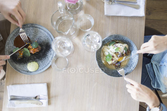 Friends having food together — Stock Photo