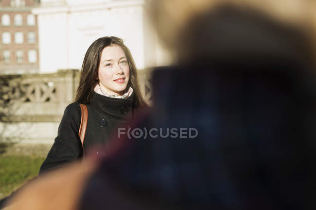 Girl looking at female friend — Stock Photo