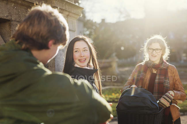 Teenage girl with friends — Stock Photo