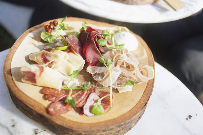 Cold cuts served on table — Stock Photo