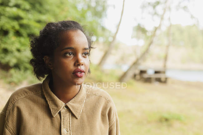Thoughtful woman, outdoors — Stock Photo
