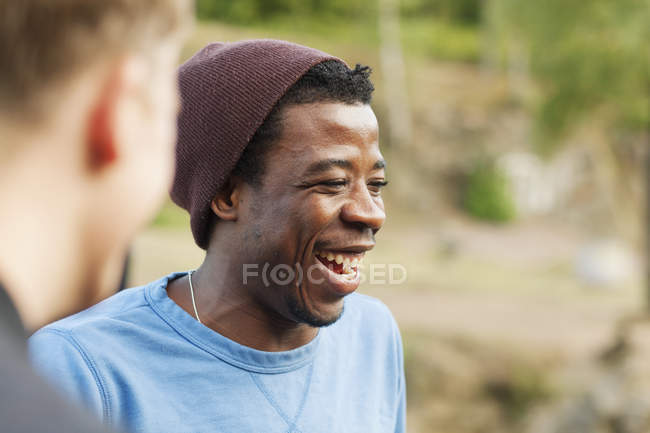 Cheerful man with friend — Stock Photo