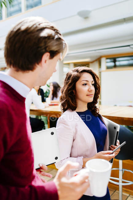 Colleagues having formal talking — Stock Photo