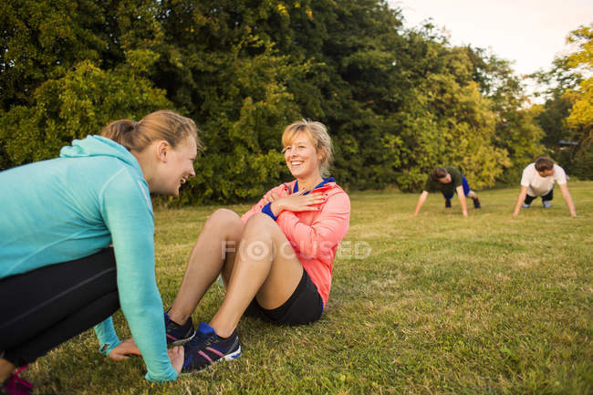Girls doing abs training — Stock Photo