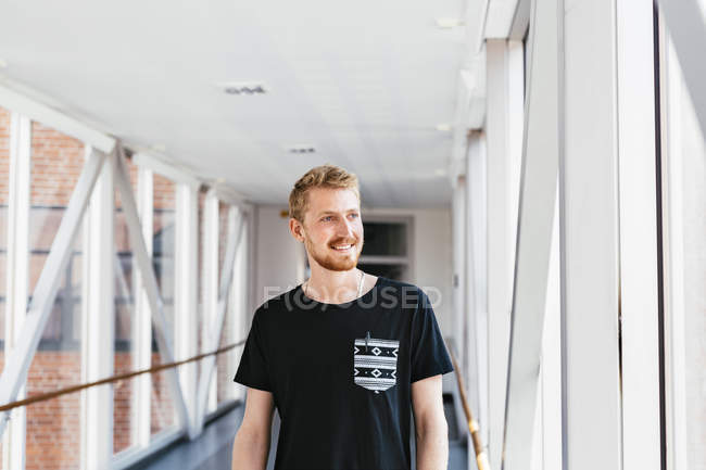 Portrait of male media student standing — Stock Photo