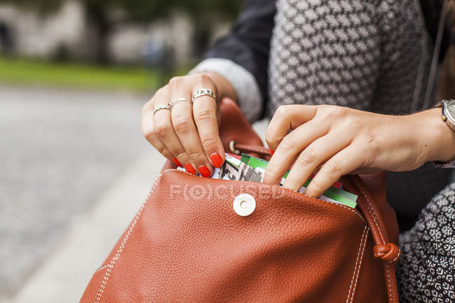 Woman removing book — Stock Photo
