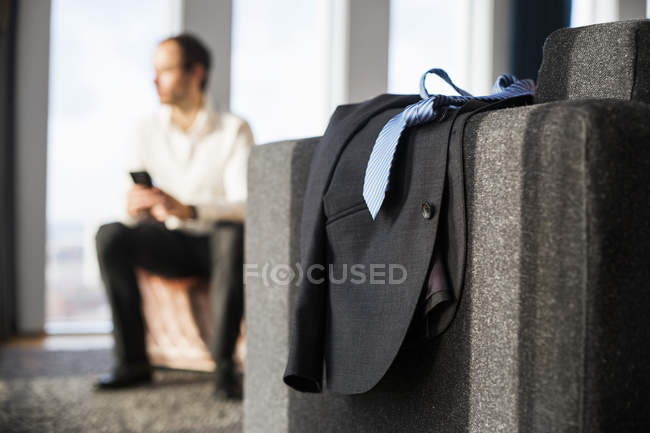 Suit and necktie on table — Stock Photo