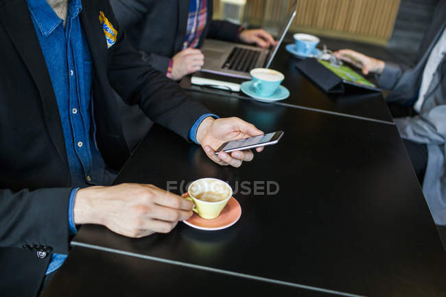 Businessmen during meeting at restaurant — Stock Photo