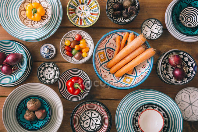 Ingredients in multi colored bowls — Stock Photo