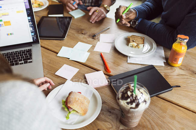People working at cafe — Stock Photo