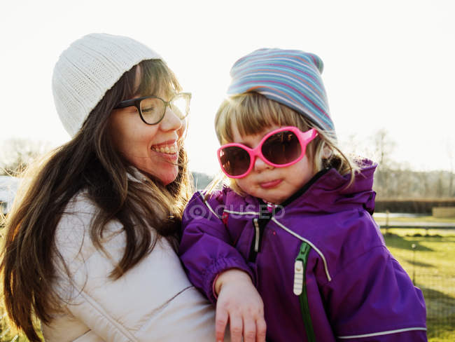 Mother with daughter at park — Stock Photo