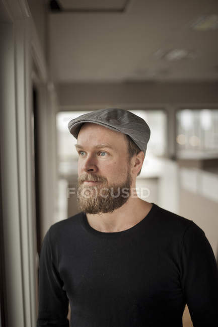 Man standing in creative office — Stock Photo