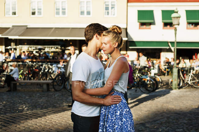 Young couple embracing — Stock Photo