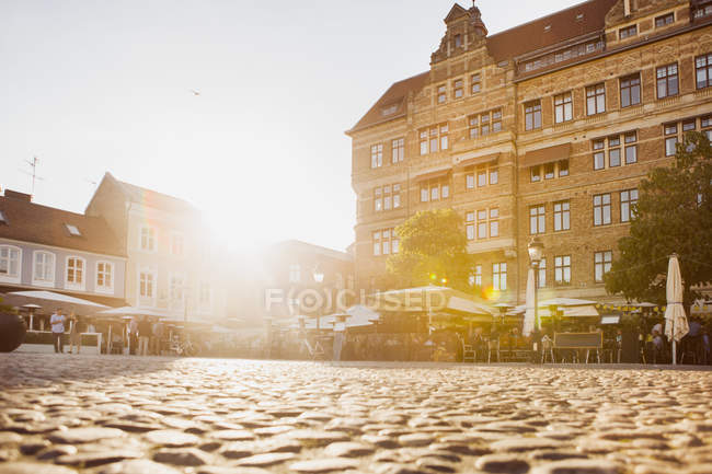 Cobbled street by buildings — Stock Photo