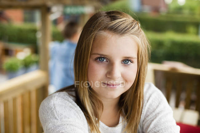 Cute girl in back yard — Stock Photo