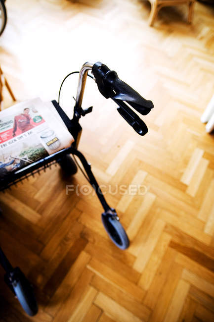 Rollator on hardwood floor — Stock Photo