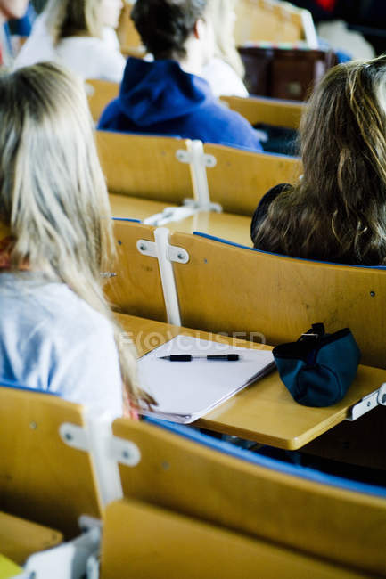 Students sitting in classroom — Stock Photo