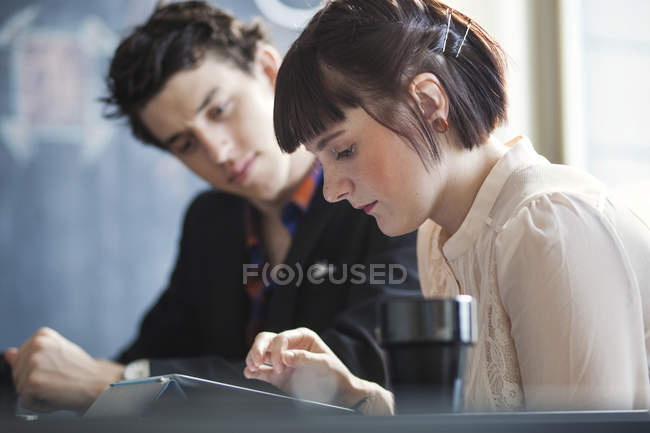 Young businessman and businesswoman — Stock Photo