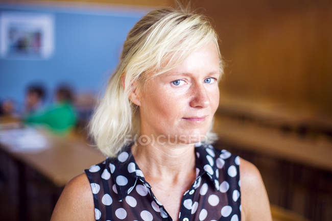 Portrait of confident teacher — Stock Photo