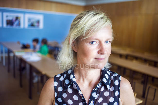 Portrait of confident teacher — Stock Photo