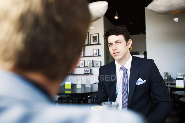 Thoughtful businessman in meeting — Stock Photo