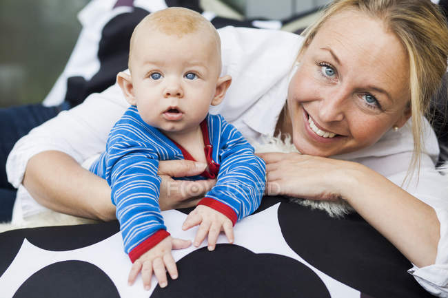 Happy mother with baby boy — Stock Photo