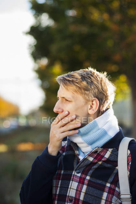Thoughtful young gay man — Stock Photo