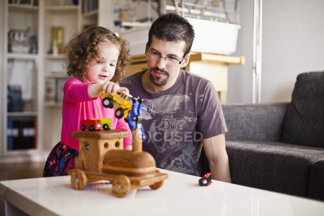 Father looking at daughter — Stock Photo