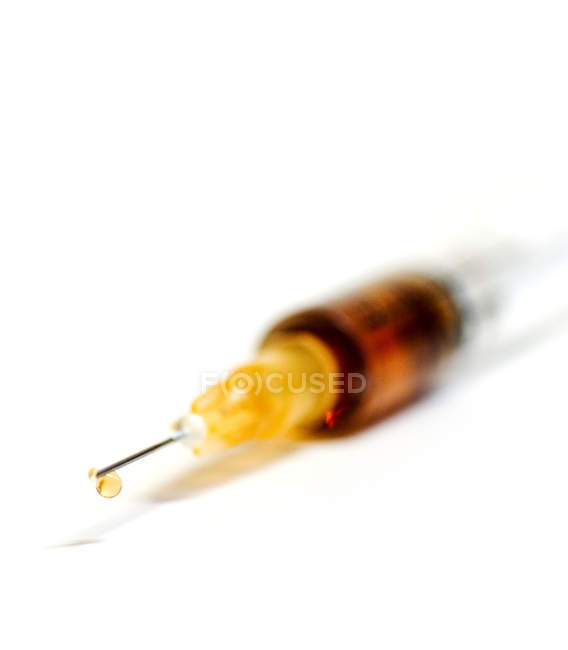 Close-up of syringe on white — Stock Photo