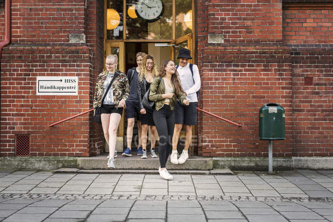 Students leaving school — Stock Photo