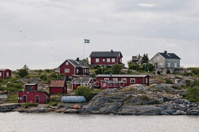 Pequenas casas por mar — Fotografia de Stock