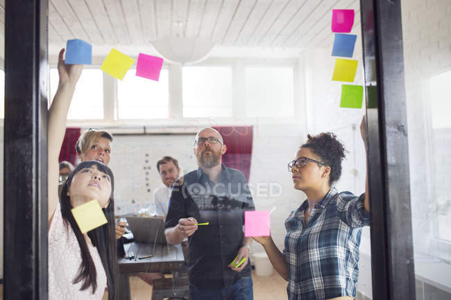 Coworkers brainstorming in office — Stock Photo