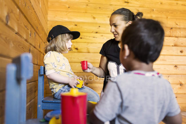 Mother playing with children — Stock Photo