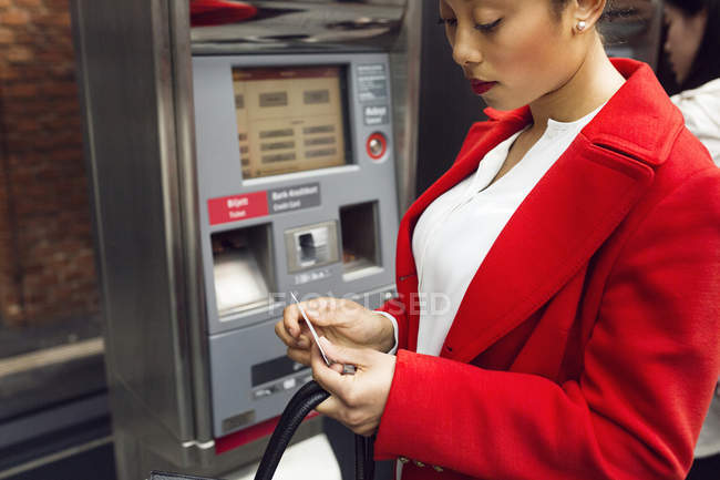 Woman  buying ticket — Stock Photo