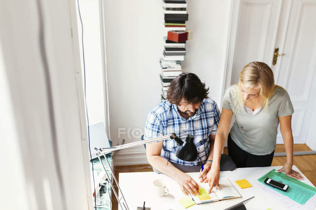 Editors discussing project at office — Stock Photo