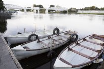Boats moored on river in Ireland — Stock Photo